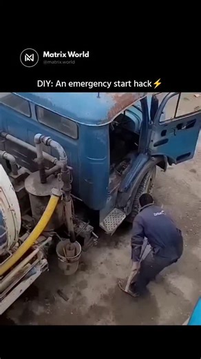 Matrix World on Instagram: "The “DIY: Emergency start h*ck!” clip shows someone getting an old blue truck running using a manual, unconventional approach with external tools. The exact steps aren’t clearly explained, but the method appears improvised and mechanical rather than electronic. The video has gone massively viral across platforms like YouTube and Facebook, gaining millions of views, often shared alongside disclaimers about safety, traffic rules, and real-world risks. Follow @matrix.wor
