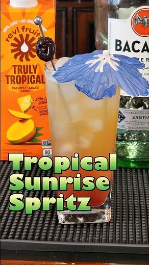 Tropical Sunrise Spritz | Pineapple Mango Rum Cocktail with Revl Fruit, Bacardi & Pellegrino