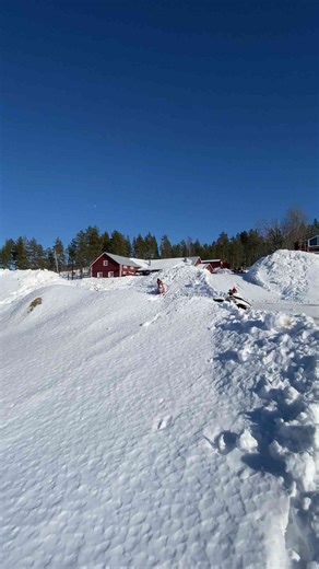 Epic Snowmobile Jump in Stunning Winter Landscape