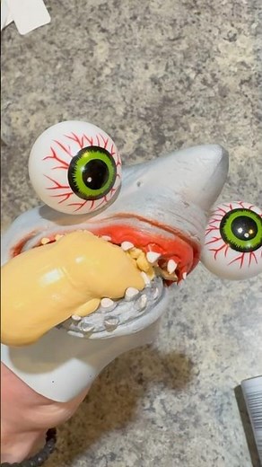 Shark puppet eats CHEESE then starts TWEAKING