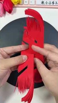 Making festive New Year ornaments with two square pieces of paper