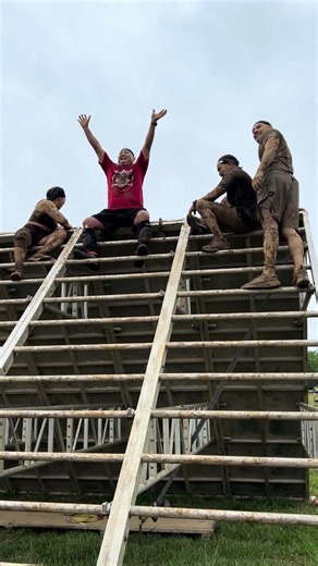 At the wet, muddy, and slippery Slip Wall obstacle. 2026 Charlotte Spartan Race Weekend Event.