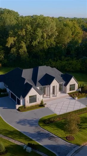 Handed off the keys to another beautiful Sapphire home dressed up with Sapphire Landscaping. Everything on this wooded lot from the landscape to the pavers and the outdoor amenities like the pergola and kitchen flow beautifully against the backdrop of this wooded lot. The year is coming to an end, but we've still got a lot more amazing projects coming. Follow us so you don't miss any! #backyarddesign #backyardgoalls #landscapingdesign #luxury #ourdoorliving | Sapphire Luxury Homes