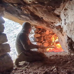 4.1M views · 43K reactions | primitive survival camping at my stone dugout #fire #survival #winter #campinglife #diy #craft #camping #shelter #mrsulo #diyprojects #wintercamping #snowstorm #wilderness #mountain #wildlife #primitive #wild #nature #cave #bushcraft #UNDERGROUND #asmr #adventure #extreme #dugout #stonedugout #outdoors #heavyrain #underground #cooking | Mr. Sulo | Facebook