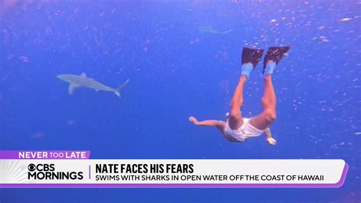 Nate once jumped from a plane with the U.S. Army to tackle his fear of heights — now, he is proving it is #NeverTooLate to face another uncomfortable place: Swimming with sharks. A few weeks ago, Nate traveled to the middle of the Pacific Ocean to swim with sharks without a cage. | CBS Mornings