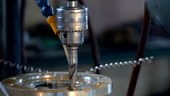 Drilling steel, slowmotion. Drilling Machine processes the metal, cut...
