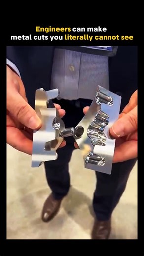 @future.explanation on Instagram: "This demonstration shows what engineers call “zero tolerance” manufacturing. Two metal parts are machined so precisely that when pressed together, the seam visually disappears. The gap is smaller than what the human eye can detect, preventing light from passing through. This matters because ultra-tight tolerances, surface finishing, and material behavior at the micron level are what enable modern aerospace, medical, and high-performance mechanical systems to fu