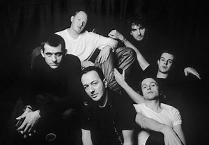 “The Mescaleros are a construction of chaos. We shamble around, and god knows how we put it together. But I think we’ve got something good rolling along here. We enjoy playing live, and we all get along. You get your juices going, you gather ‘round the world again—a very stimulating experience in total, you know?” Joe Strummer on the Mescaleros, 1999-2002. | Joe Strummer