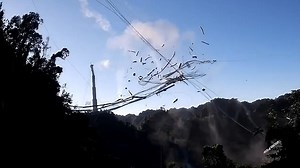 Moment huge telescope, once scaled by James Bond, collapses