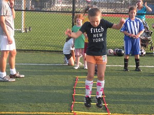 Collegiate Players and Coaches Host Youth Soccer Clinic