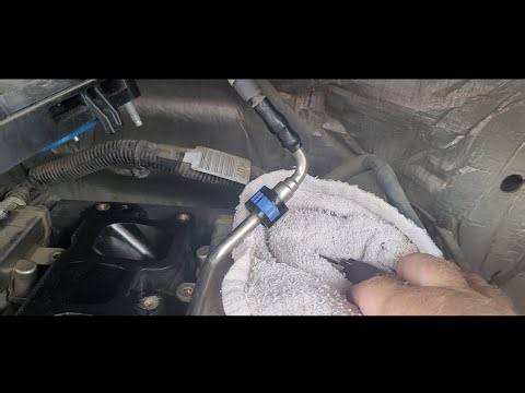 Detaching and resetting or removing a quick connector to a 2015 F0RD f150 fuel line to fuel rail