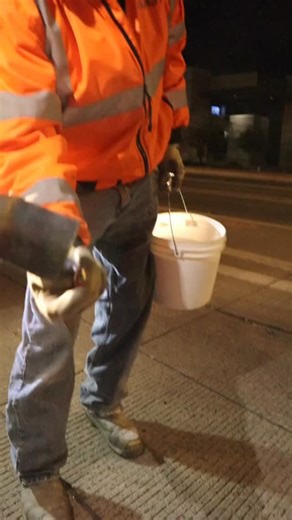 Come along as we replace worn-out pavement markings. And, it involves fire! 🔥 When pavement markings reach the end of their life, it’s time to replace them. For this we use thermoplastic “burn-down” markings, named for the propane torch crews use to bond them to the pavement. The process starts with grinding off the old, worn markings using specialized equipment. Next, crews place the thermoplastic stickers onto the pavement – a step that literally requires getting down on hands and knees to pr