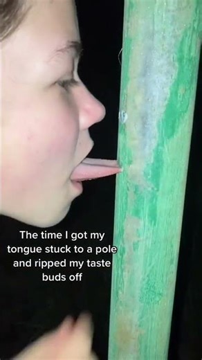 girl tongue stuck to a pole