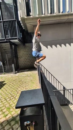 Urban Parkour Moves across City Buildings and Obstacles