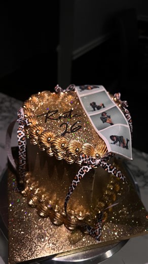 Pamela Anaele on Instagram: "Route 26!! Topper by @ziandi_boutique. 6 inch gold chrome coquette heart cake with Polaroid photos. #goldcake #goldheart #heartcake #vintagecake #glittercake #goldchrome #cakereels #caketrends #cakesofinstagram #baltimorebaker #baltimorecakes #trendingreels #blowthisup #dmvbaker #dmvcakes #cutecake #customcakes #luxurycakes #coquette #coquettecake #bowcake #leopardprint #26 #polaroid #picturecake"