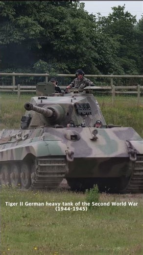 German Tiger II, King Tiger (Königstiger) heavy tank of the 2nd World War driving at The Tank Museum