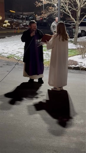THE BLESSING OF THE TREE Father Dave blesses the Christmas tree after Mass. | Mother of Sorrows Parish
