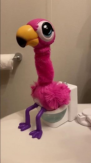 Gotta Go Flamingo Toy Pooping in the Potty