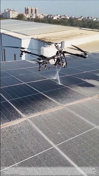 The process of cleaning solar panels using drones.