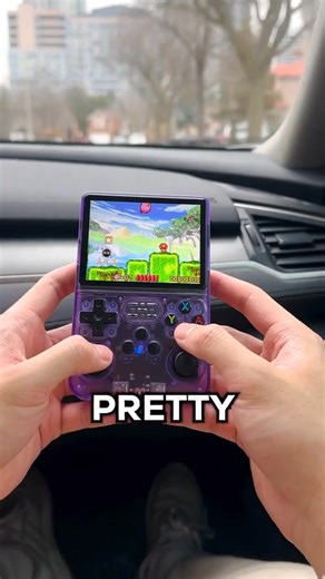 ✔ Large Color Display (box visuals) – Enjoy classic games in high resolution with a 640x480 pixel screen. ✔ Built-in Retro Games (image: "019 cybots" & car game) – Comes preloaded with popular titles from arcade, NES, CP System II, and more. ✔ Transparent Purple Body (actual product) – Stylish and nostalgic design with visible circuitry and full button layout. ✔ Dual Analog Sticks Full Keypad – Offers modern control flexibility for racing, fighting, and adventure games. | Gulf Mart