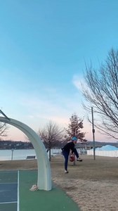 This guy demonstrated impressive skills when it came to shooting hoops. Within seconds, he bounced the ball off a hoop pillar, spun around while passing the ball below his knee, and then shot it from right behind. Sure enough, the ball went throug... | Jukin Copyright Management | Facebook