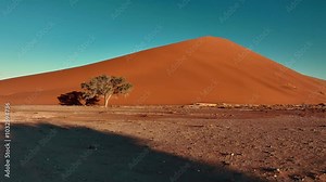 Aerial of Dune 45 near Sesriem Sossuvlei national park in Namibia, with a view on the surroundings composed of giant dunes.