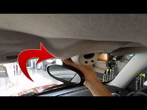 How do you replace the interior rearview mirror on the Mini?