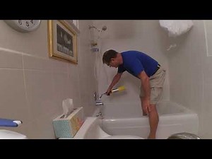 Unstucking bathtub spout