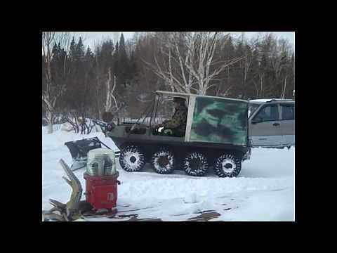 Argo Conquest 8x8 plowing snow