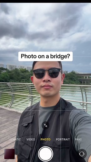 Photo tip for a creative self portrait on a bridge! Use the side railing to frame your shot. See how i did it here! #photography #mobilephotography #viral #learningisfun