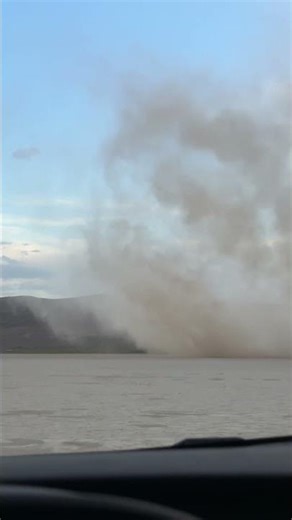 Massive Dust Devil Swirls Across Desert Playa