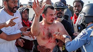 Terrifying moment semi-truck drives through protesters on Minneapolis bridge
