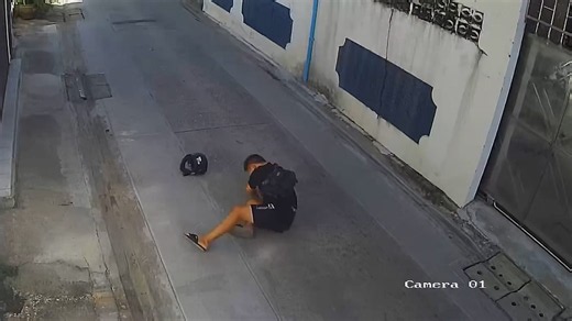 Motorcycle rider clotheslined by hanging cable in Thailand