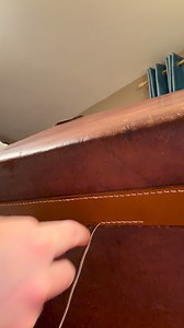Stitching blind 👀 Hand-stitching a seam on the back of a leather suitcase — my left hand hidden inside, working purely by feel and muscle memory. No machines, just two needles, waxed thread and rhythm. Traditional saddlery skills that take years to learn, still done one stitch at a time. ✨ #handstitching #leathercraft #joTheSaddler #artisanleather #saddlery #britishcraft #heritagecraft #madeinwiltshire #handmadeuk #craftswoman #slowmade | Jo the Saddler