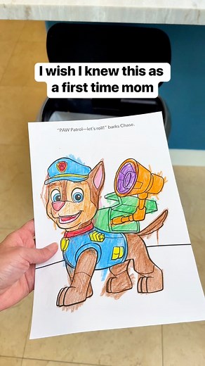 2M views · 10K reactions | How to turn art into clothing using cling wrap, parchment paper, and an iron for a fun DIY fabric transfer #kidsart #kidsclothes #mom #diycrafts | Liz & Jeff | Facebook