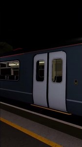 Class 319 slowly passing Morganstown Docks