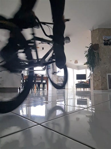 Kitchen BMX. Trying to get a trick I've never done... 180 hop to half cab on flat. #180 #halfcab #bmx #kinkbmx #fyp