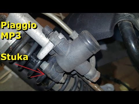 What could be Knocking on a Piaggio MP3? Shock Absorber Lockout Actuator/Hydraulic Tilt Lockout.