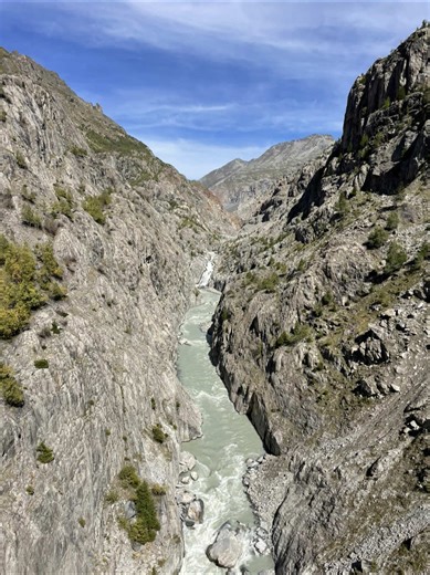 Looking down 👀 80m above a roaring glacier river — not for the faint of heart. This is the famous 124m long Hängebrücke connecting #Belalp and #Riederalp, with views carved by the mighty #Aletsch glacier. Would you cross it or just admire from a safe distance? 🌉💦 #SwissAlps #Switzerland @visitswitzerland @Switzerland @AletschGlacier