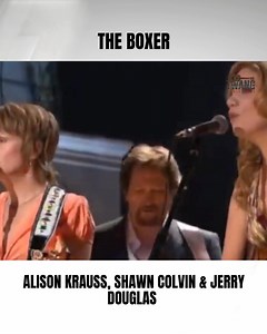 Alison Krauss, Shawn Colvin, and Jerry Douglas turn “The Boxer” into a gentle, powerful reminder that even weary hearts can rise and keep fighting. #countrymusic #countrysongs #countrymusicfans #countryliving #countrylife #countryhits | This Is Real Country