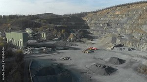 Drone shot of quarry. Open pit mine where stone, rock and sand is excavated. Aerial shot of quarry. Open-pit mine in which dimension stone, rock, construction aggregate, riprap, sand, gravel, or slate