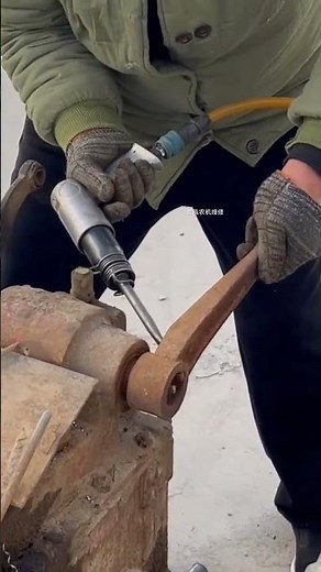 Pneumatic chipping hammer also known as an air hammer, to work on a piece of metal#shortsfeed