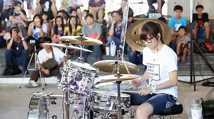 Korean Girl Entertains and Plays Drums like a Pro