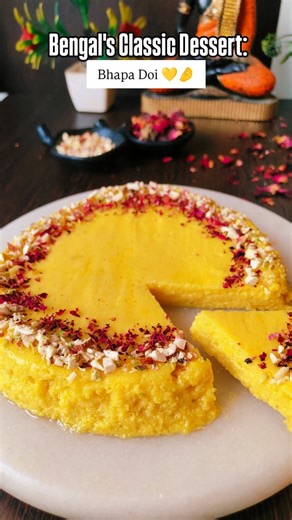 Raksha Jain on Instagram: "Bengal's Classic Dessert: Bhapa Doi ♥️ Get ready to indulge in the quintessential Bengali dessert! Here are the ingredients: ✨ Hung Curd: 2 cups (Use fresh curd. Strain it through a muslin cloth and refrigerate until all the water is drained) ✨ Condensed Milk: 1 cup ✨ Elaichi Powder (optional) ✨ Saffron/Kesar (optional) Feel free to experiment with various flavors like rose, mango, or lichi! Recipe: 1. Blend all the ingredients until smooth. 2. Pour the mixture into a 