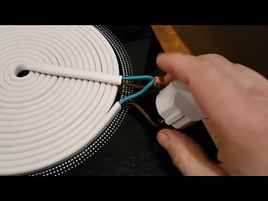 receiving of free energy from an induction cooker using a bifilar coil of Nikola Tesla