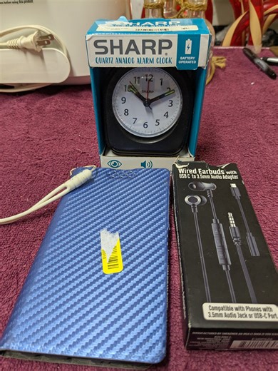 Ann's Bargain Bin Auction | Week 1 Item 23 NEW unopened Sharp alarm clock, phone case and wired earbuds Starting bid $2 | Facebook