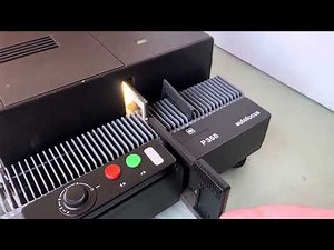 ROLLEI P355 Autofocus 35mm Slide Projector With Remote Demo