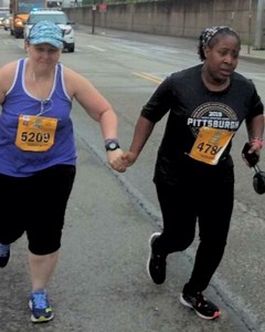 Marathon makes friends out of complete strangers as 2 women help each other cross finish line