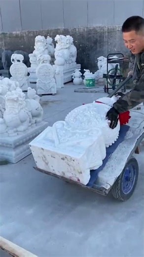 moving stone statues using a cart
