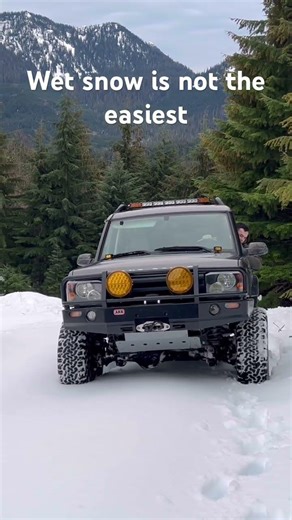 Land Rover in deep snow